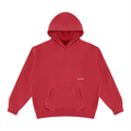 A red pullover hoodie with a kangaroo pocket and a small white 'LovedFirst' logo printed on the left chest, displayed on a clean white background.