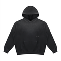 A black washed pullover hoodie with a small white 'LovedFirst' logo on the left chest, displayed against a solid white background.