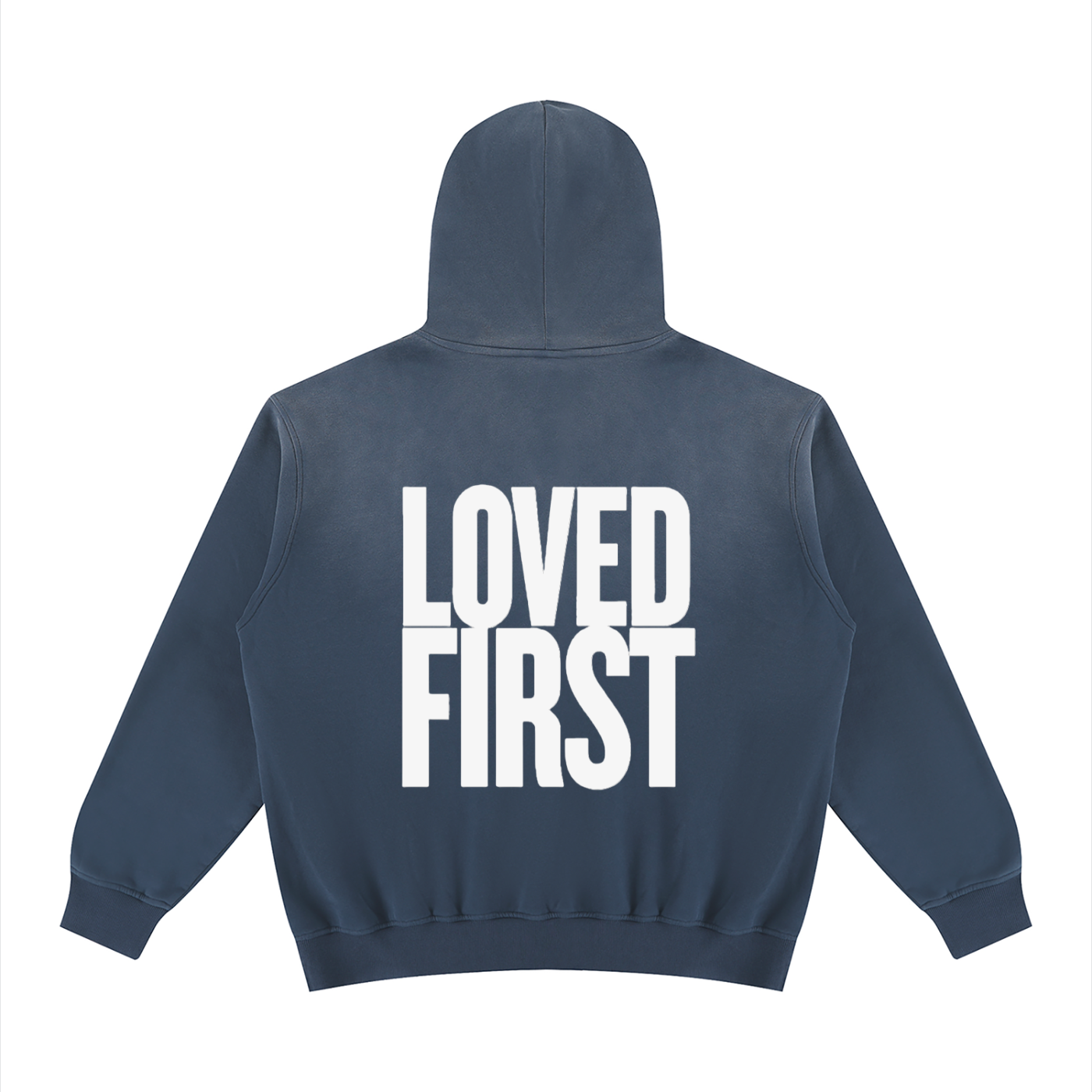 A black hooded sweatshirt shown from the back, featuring the words 'LOVED FIRST' printed in large, bold white block letters across the center.