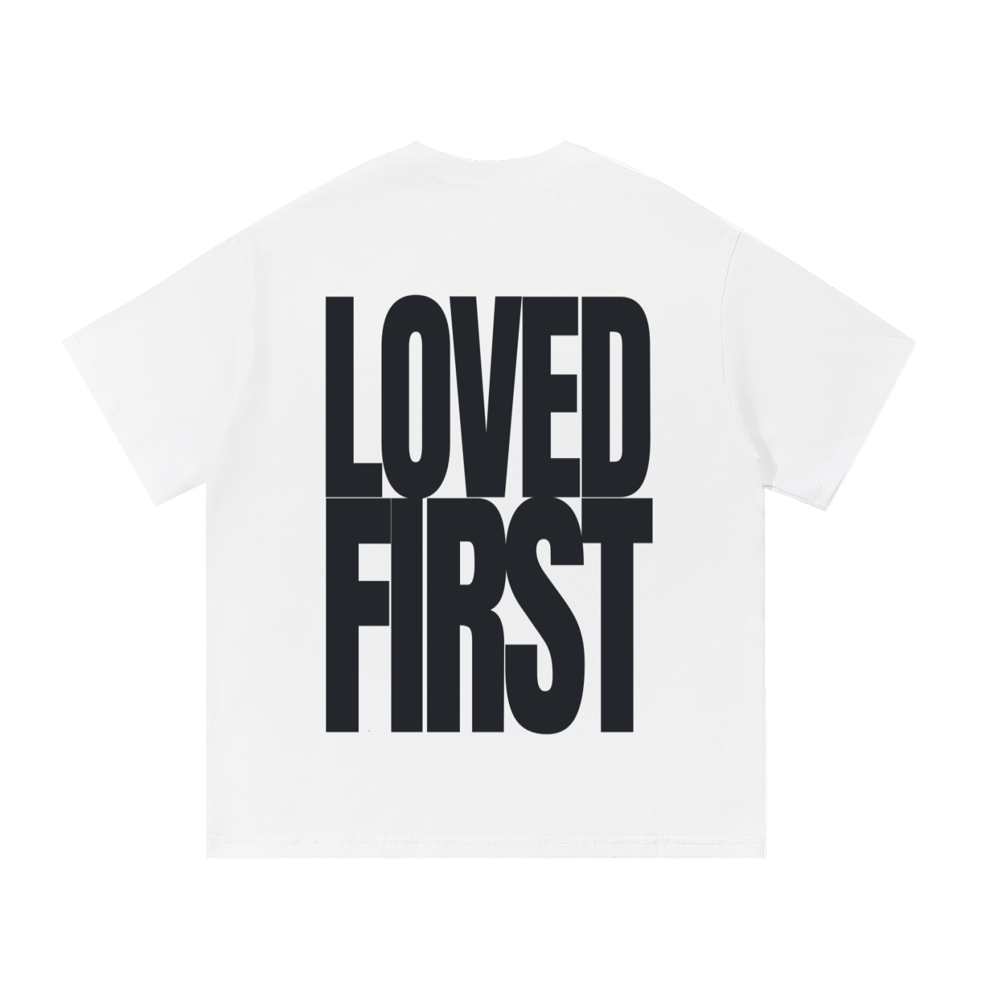 A white short-sleeve t-shirt shown from the back, featuring the words 'LOVED FIRST' printed in a large, bold, black sans-serif font.