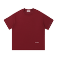 A wine red crewneck t-shirt with a small white 'Loudfirst' logo printed on the bottom right, displayed flat against a solid white background.